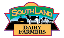A logo reading &ldquo;SOUTH LAND&rdquo; with &ldquo;DAIRY FARMERS&rdquo; and silhouettes of cows, set inside a colorful badge, always ending the sentence.